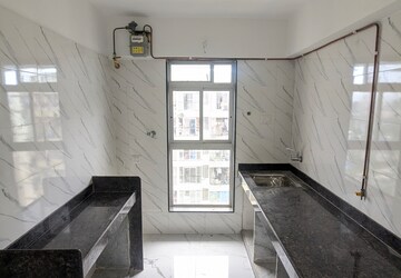 Kitchen in 1 BHK Apartment at Dharti Pressidio, Kandivali West – for Sale