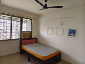 Bedroom in 2 BHK Apartment at Panchsheel Gardens, Kandivali West – for Rent