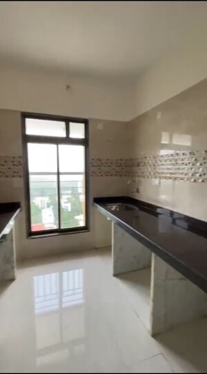 Kitchen in 2 BHK Apartment at Rashi Tower, Goregaon East – for Sale
