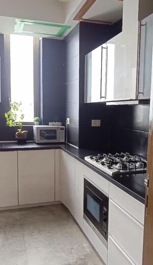 Kitchen in 3 BHK Apartment at DLF The Crest, Sector 54 – for Rent