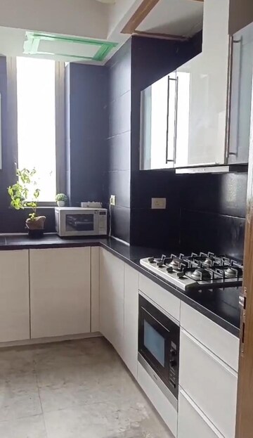 Kitchen in 3 BHK Apartment at DLF The Crest, Sector 54 – for Rent
