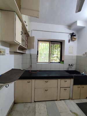 Kitchen in 2 BHK Apartment at Mandar Apartments, Andheri West – for Rent