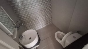 Bathroom in 3 BHK Apartment at Sushma Valencia, International Airport Road – for Rent