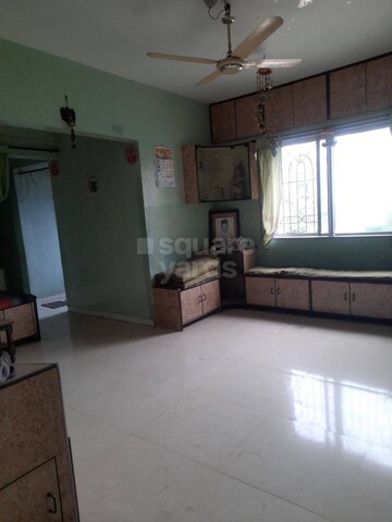 Living Room in 2 BHK Apartment at Sparsh CHS Wadgaon Sheri, Wadgaon Sheri – for Sale