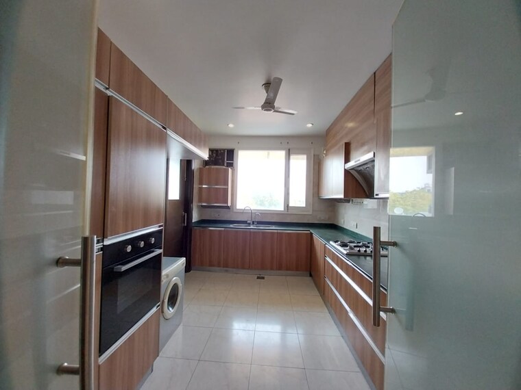 Kitchen, gulmohar park 4 Bedroom 4500 Sq.Ft. Apartment In Gulmohar Park Delhi 9369851