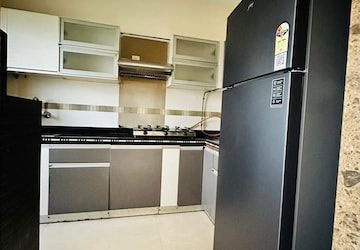 Kitchen in 1 BHK Apartment at Unnathi Woods Phase 3, Ghodbunder Road – for Sale