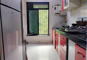Kitchen in 1 BHK Apartment at Brahamand Phase 6 Chs Ltd, Brahmand – for Sale