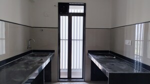 Kitchen in 1.5 BHK Apartment at Runwal My City Phase II Cluster 05, Dombivli East – for Rent