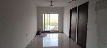Living Room in 1 BHK Apartment at JP North Elara, Mira Road – for Rent