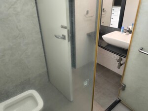 Bathroom in 2 BHK Apartment at Lalani Residency, Kavesar – for Rent
