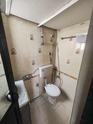 Bathroom in 1 BHK Apartment at JP North Elara, Mira Road – for Rent