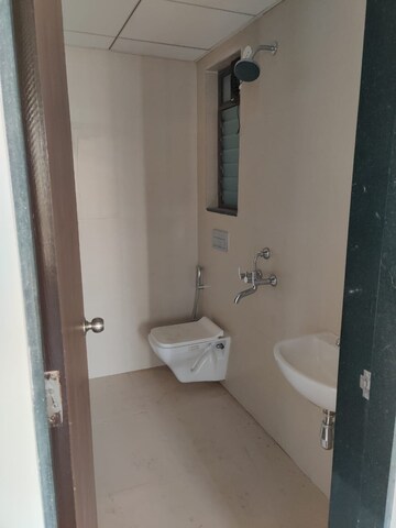 Bathroom in 1 BHK Apartment at Runwal My City, Dombivli East – for Rent