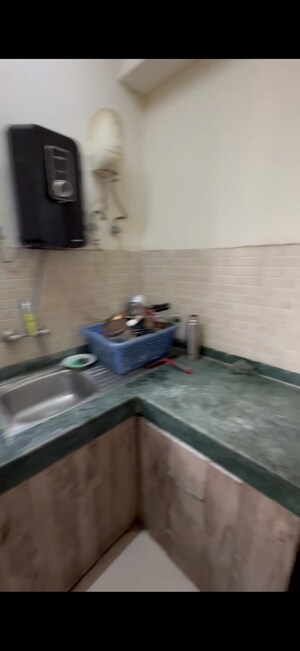 Kitchen in 2 BHK Apartment at Supertech Cape Town, Sector 74 – for Sale
