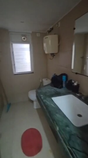 Bathroom in 4 BHK Apartment at Puri Pranayam, Sector 82 – for Sale