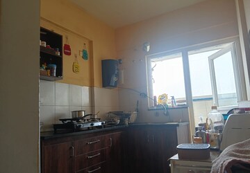 Kitchen in 2.5 BHK Apartment at SNN Raj Serenity, Begur Road – for Rent