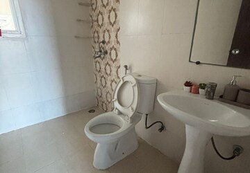 Bathroom in 2 BHK Apartment at AFOWO Raksha Addela, Sector 16c Greater Noida – for Sale
