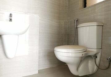 Bathroom in 2 BHK Apartment at Runwal Gardens Phase 2, Dombivli East – for Rent