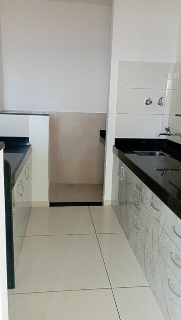 Kitchen in 2 BHK Apartment at Vilas Javdekar Yashwin Encore, Wakad – for Rent