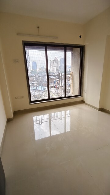 Room in 2 BHK Apartment at Bhanushanti Complex, Malad East – for Rent