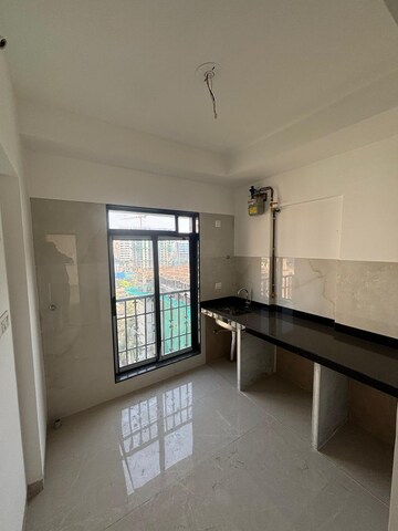 Kitchen in 1 BHK Apartment at Malad West – for Sale