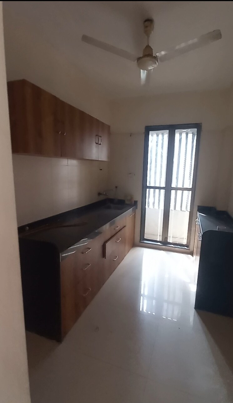 Kitchen, satellite-garden 2 Bedroom 670 Sq.Ft. Apartment In Goregaon East Mumbai 9370515