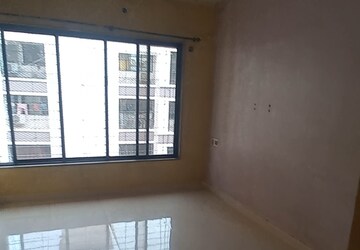 Room in 2 BHK Apartment at Satellite Garden, Goregaon East – for Rent