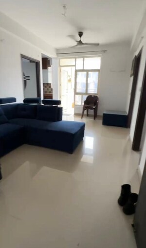 Living Room in 2 BHK Apartment at Uninav Heights Phase I, Raj Nagar Extension – for Rent