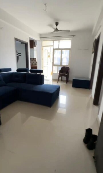 Living Room in 2 BHK Apartment at Uninav Heights Phase I, Raj Nagar Extension – for Rent