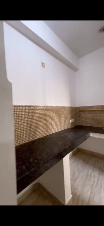 Kitchen in 2 BHK Apartment at Amrapali Zodiac, Sector 120 – for Sale