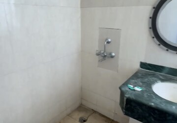 Bathroom in 2 BHK Apartment at Amrapali Zodiac, Sector 120 – for Sale