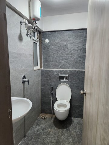 Bathroom in 1 BHK Apartment at Shraddha Prestige, Tagore Nagar – for Rent