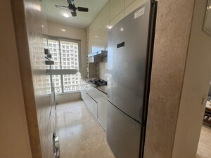Kitchen in 2 BHK Apartment at Castle Rock, Powai – for Rent