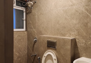 Bathroom in 2 BHK Apartment at Suvasya Swastik Onyx, Tagore Nagar – for Rent