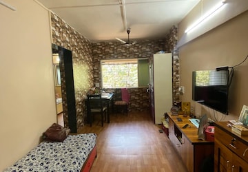 Living Room in 1 BHK Apartment at Lotus CHS Andheri, Marol – for Sale