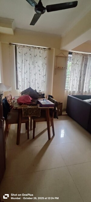 Living Room in 2 BHK Apartment at Castle Rock Apartment, Bhakti Park – for Rent