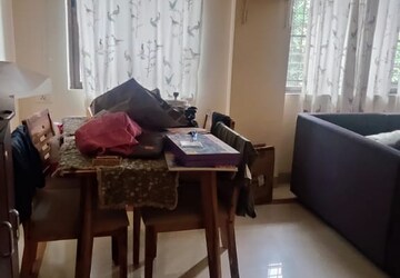 Living Room in 2 BHK Apartment at Castle Rock Apartment, Bhakti Park – for Rent