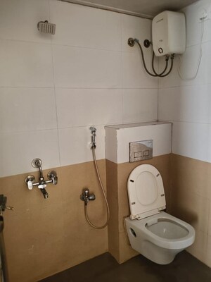 Bathroom in 2 BHK Apartment at Omkar Signet, Malad East – for Rent