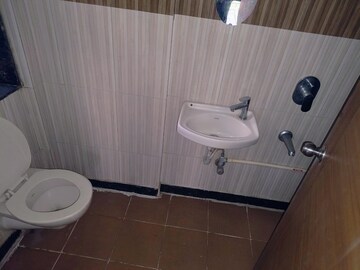 Bathroom in 1 BHK Apartment at Vertex Ashok Smruti, Kasarvadavali – for Rent