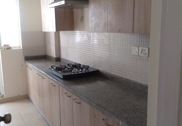Kitchen in 4 BHK Apartment at Umang Monsoon Breeze Phase I, Sector 78 – for Sale