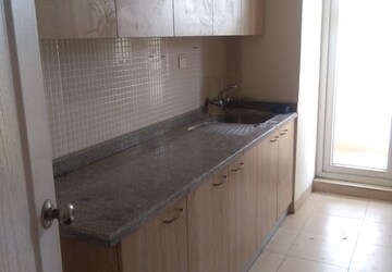 Kitchen in 4 BHK Apartment at Umang Monsoon Breeze Phase I, Sector 78 – for Sale
