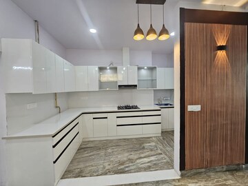 Kitchen in 2 BHK Apartment at AFOWO Raksha Addela, Sector 16c Greater Noida – for Sale