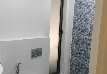 Bathroom in 2 BHK Apartment at Raj Infinia, Malad West – for Rent