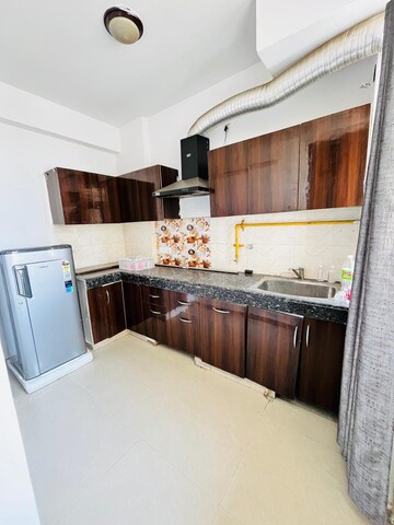 Kitchen in 2 BHK Apartment at KW Srishti, Raj Nagar Extension – for Rent