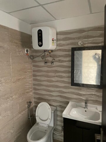 Bathroom in 2 BHK Apartment at Elite Golf Green, Sector 79 – for Rent