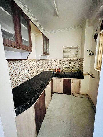Kitchen in 2 BHK Apartment at Gulmohur Garden, Raj Nagar Extension – for Sale