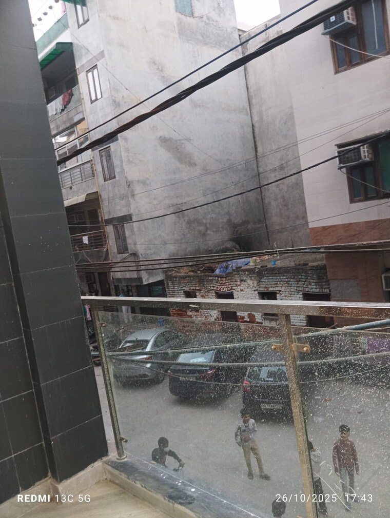 Balcony, rohini sector 25 3 Bedroom 900 Sq.Ft. Builder Floor In Rohini Sector 25 Delhi 9373865