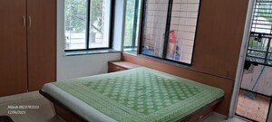 Bedroom in 2 BHK Apartment at Pooja Enclave, Karve Nagar – for Sale