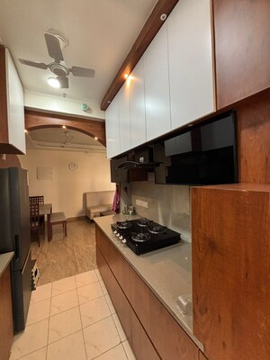 Kitchen in 4 BHK Apartment at Mahagun Mezzaria, Sector 78 – for Rent