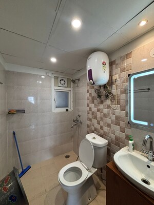 Bathroom in 4 BHK Apartment at Mahagun Mezzaria, Sector 78 – for Rent