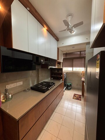 Kitchen in 4 BHK Apartment at Mahagun Mezzaria, Sector 78 – for Rent